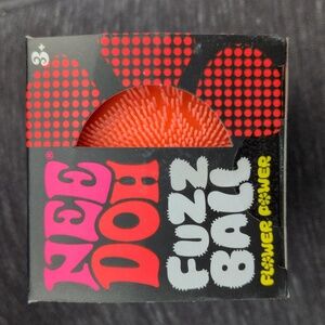 ORANGE Needoh FUZZ BALL Flower Power Nee Doh Squish Stress Ball